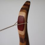 Ушки крепления тетивы